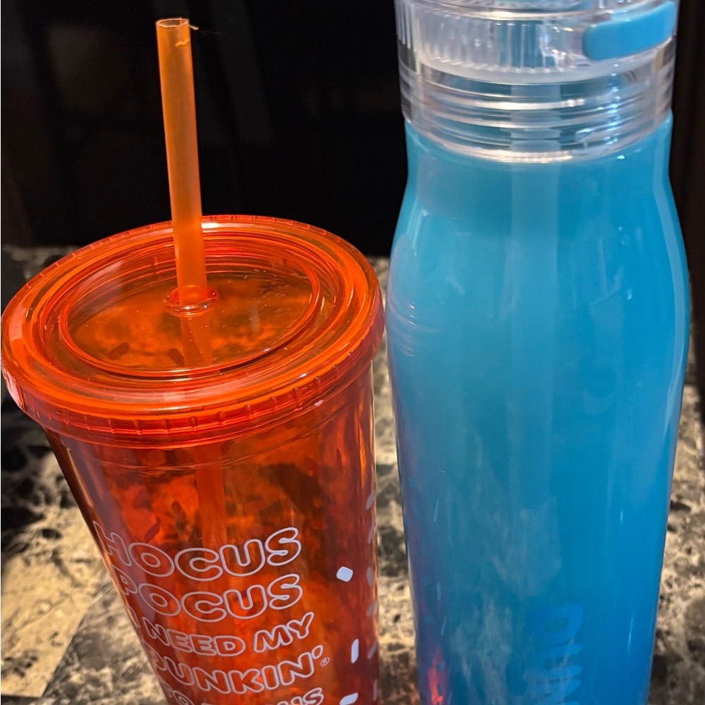 Orange Halloween Dunkin Donuts and Blue Dunkin Donuts tumbler